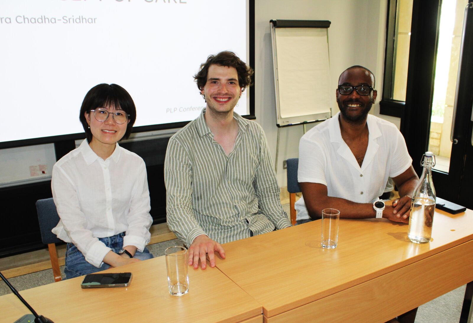 A paper session at the First PLP Graduate Conference, the screen showing Ira Chadha-Sridhar’s ‘The Legal Concept of Care’ (University of Cambridge), Oxford